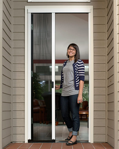 Venette on front door with homeowner opening the door