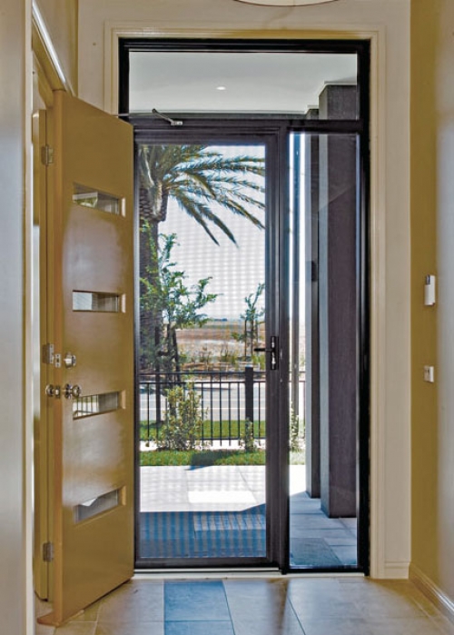 SupaScreen hinged door on modern home means the door can be left open on any hot days